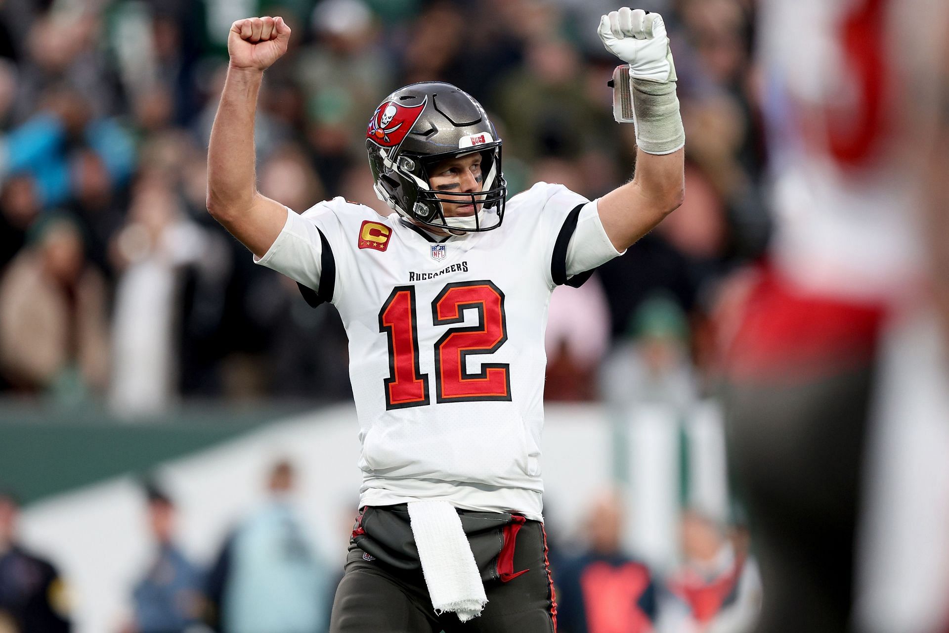 Tampa Bay Buccaneers quarterback Tom Brady celebrates on the field