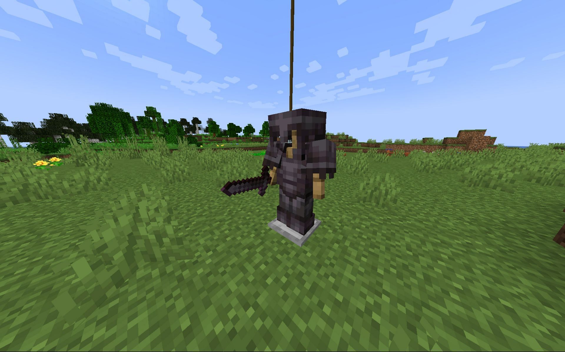 A Netherite armor set and sword (Image via Minecraft)