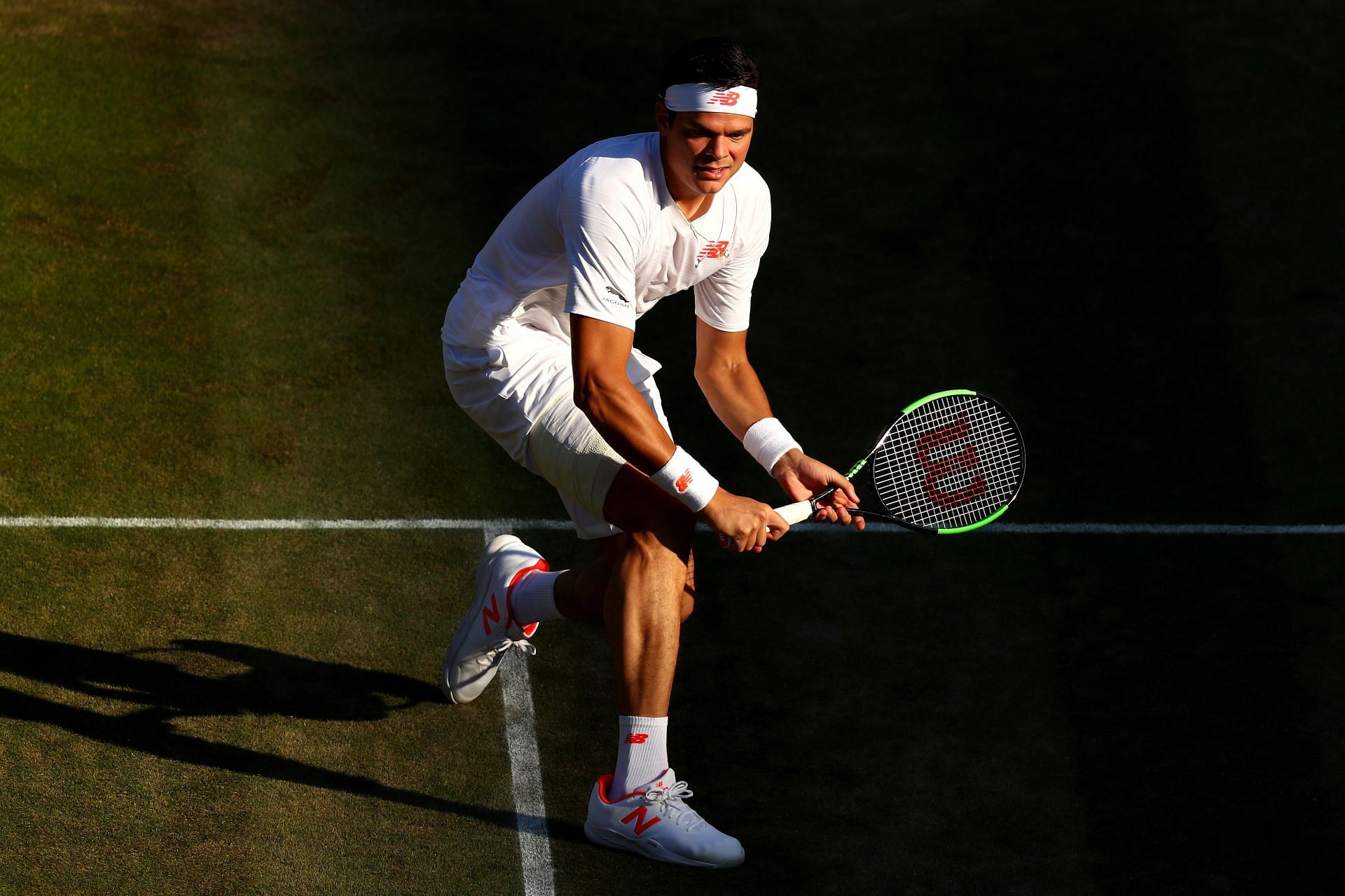 Milos Raonic in action at the 2018 Wimbledon Championships
