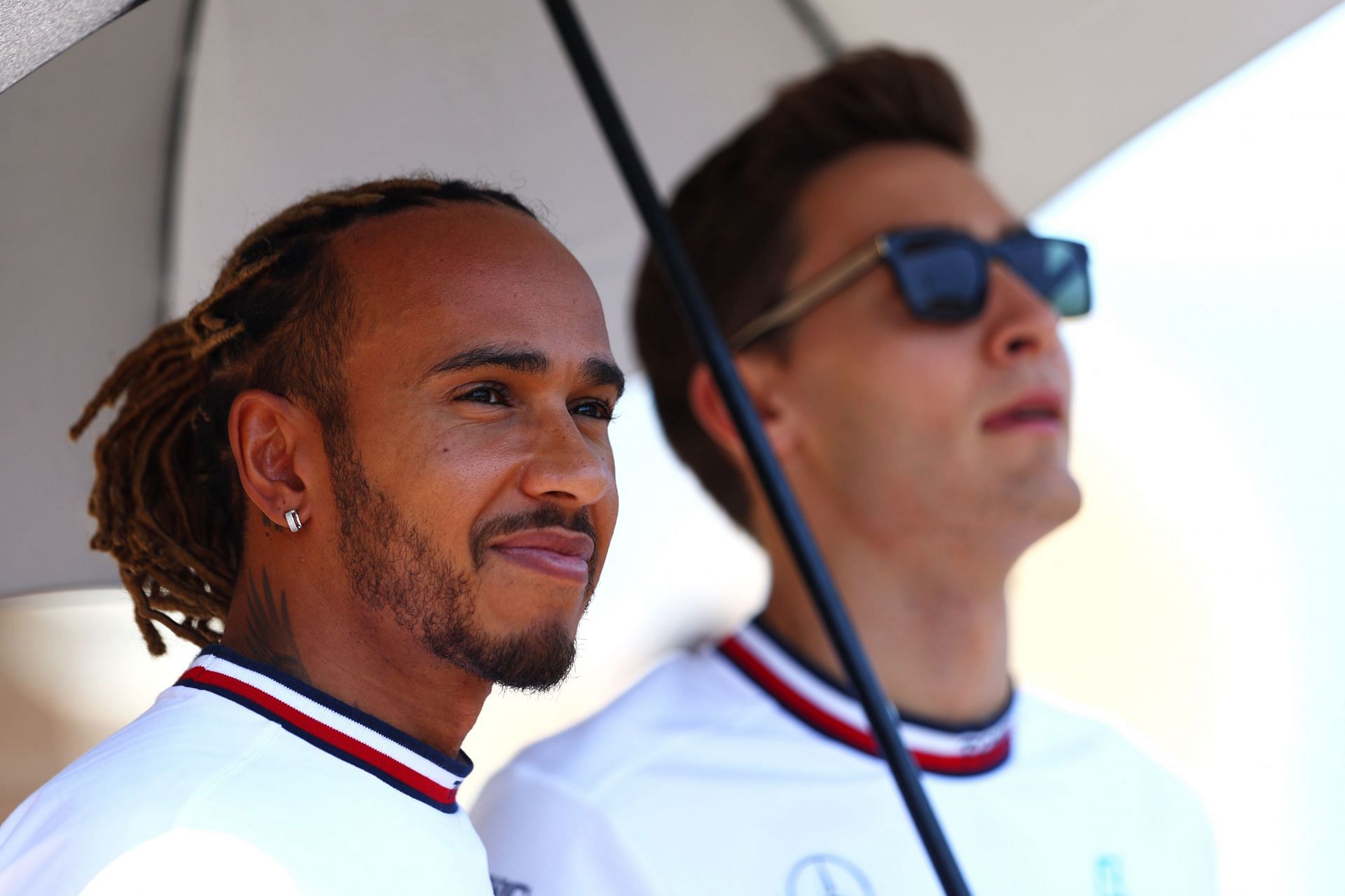 Lewis Hamilton (left) and George Russell (right) photographed before the 2022 F1 Azerbaijan GP (Photo by Clive Rose/Getty Images)