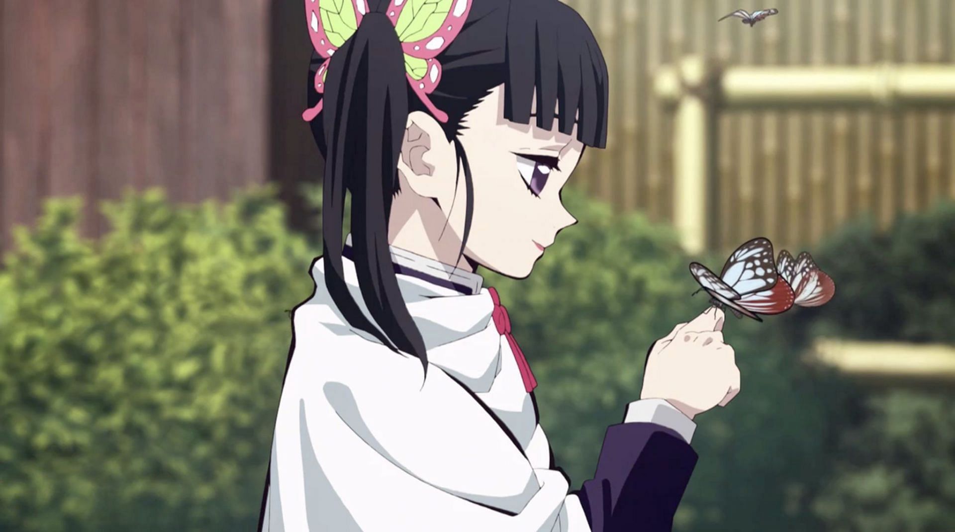 Tsuyuri Kanao with a butterfly on her finger (Image via Ufotable)