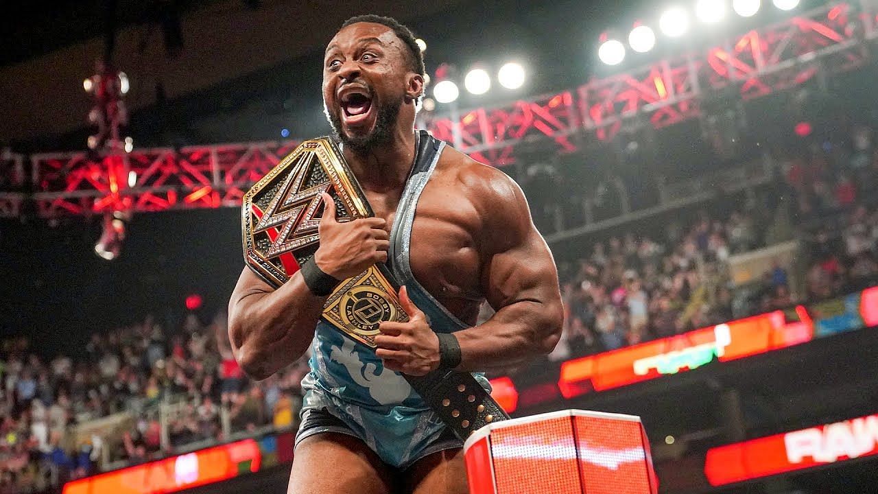 Big E celebrates with the WWE Championship.