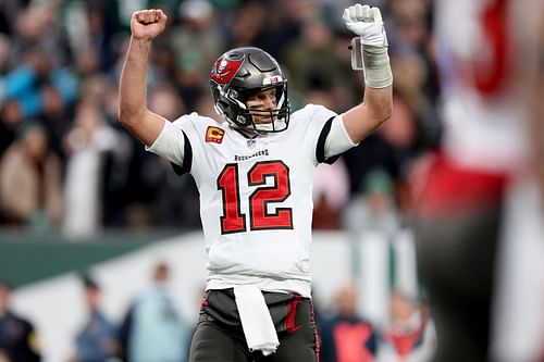 Tampa Bay Buccaneers quaterback Tom Brady celebrates on the field