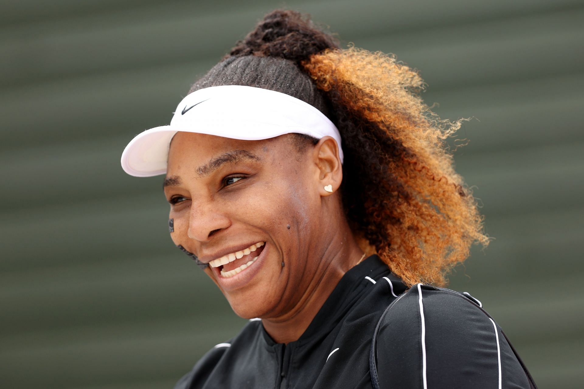 Serena Williams smiles during a training session ahead of the 2022 Wimbledon Championships