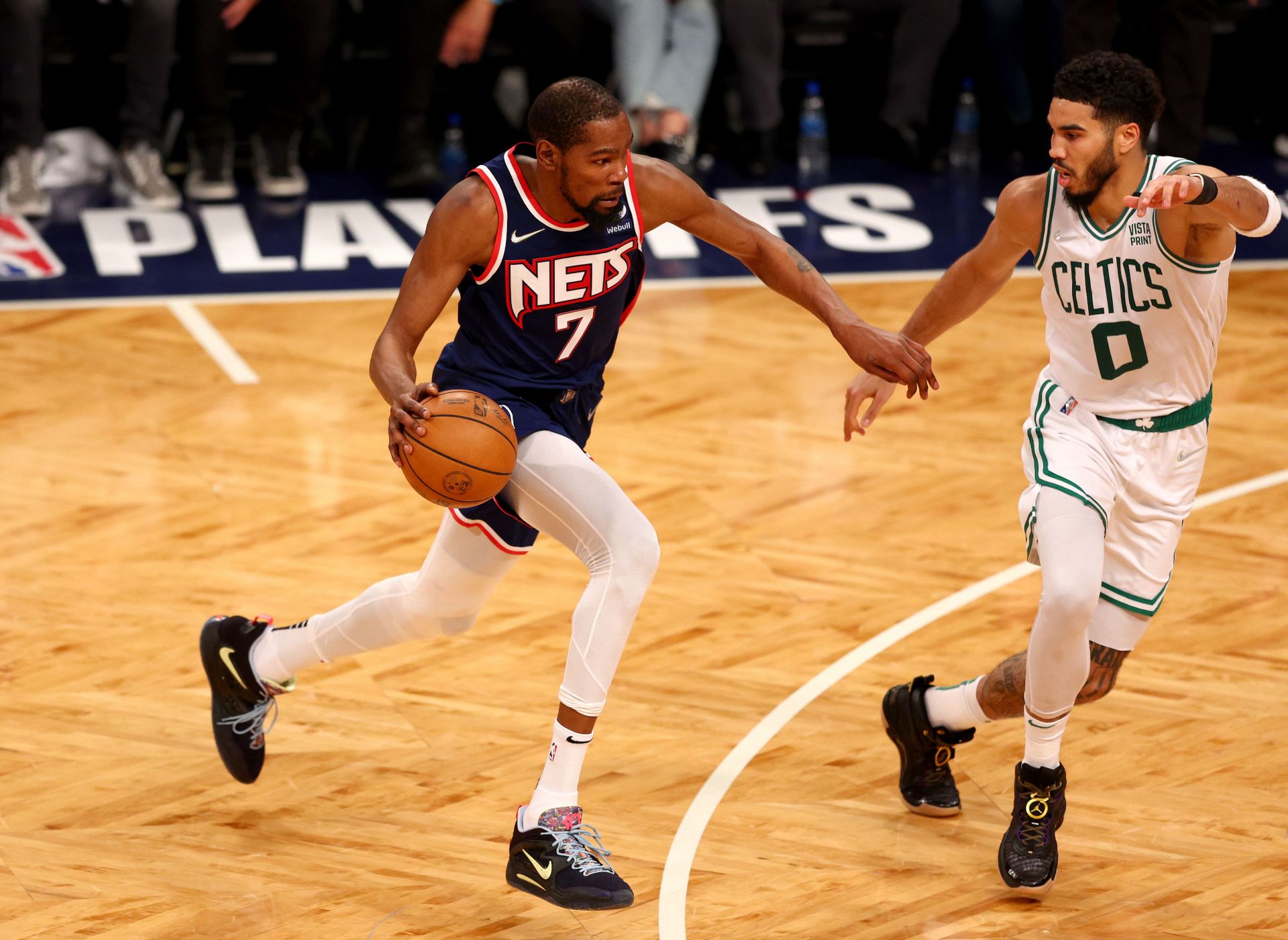 Kevin Durant #7 of the Brooklyn Nets drives as Andre Drummond #0 of the Brooklyn Nets defends during Game Four of the Eastern Conference First Round Playoffs at Barclays Center on April 25, 2022 in the Brooklyn borough of New York City