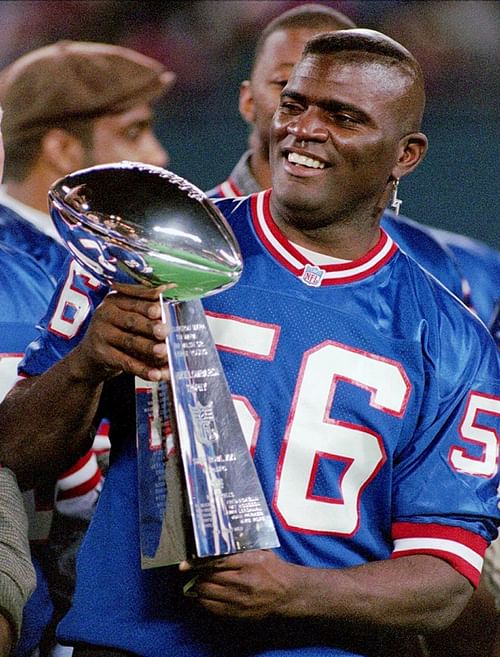 Taylor celebrates with Vince Lombardi trophy