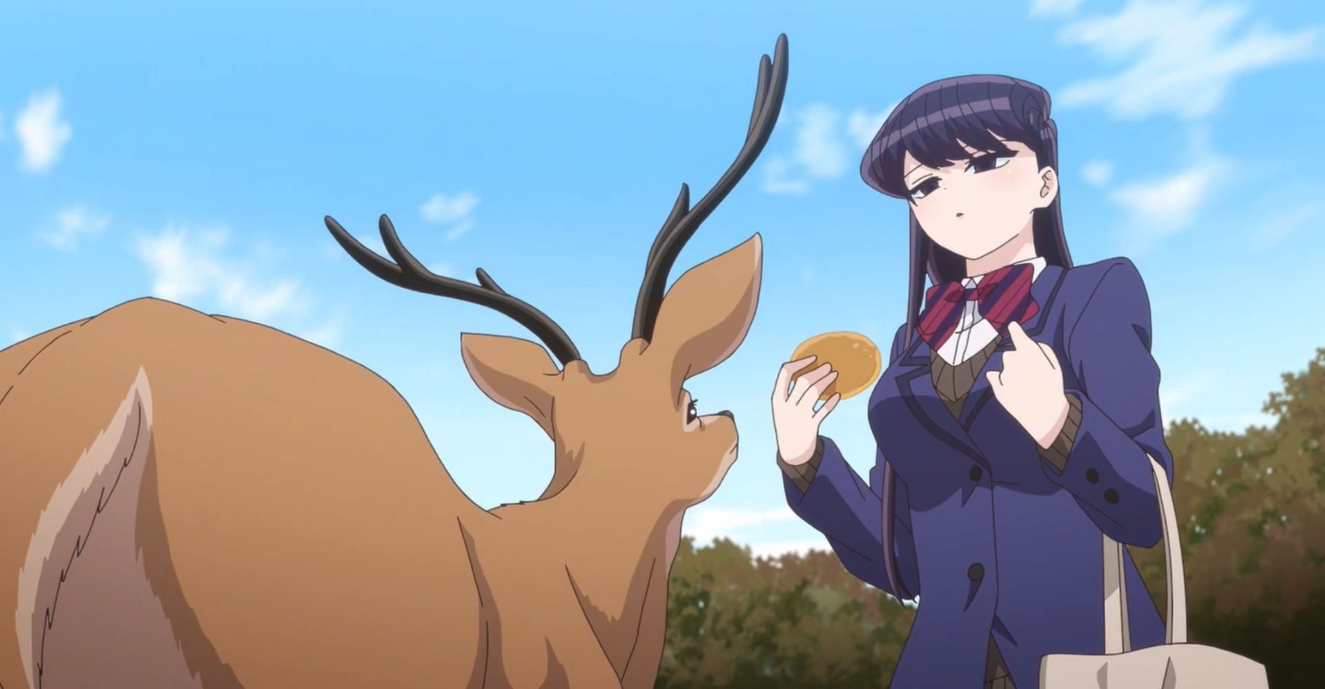 Komi interacts with a deer in Nara (image via Komi Can&rsquo;t Communicate, Shogakunan and OLM)