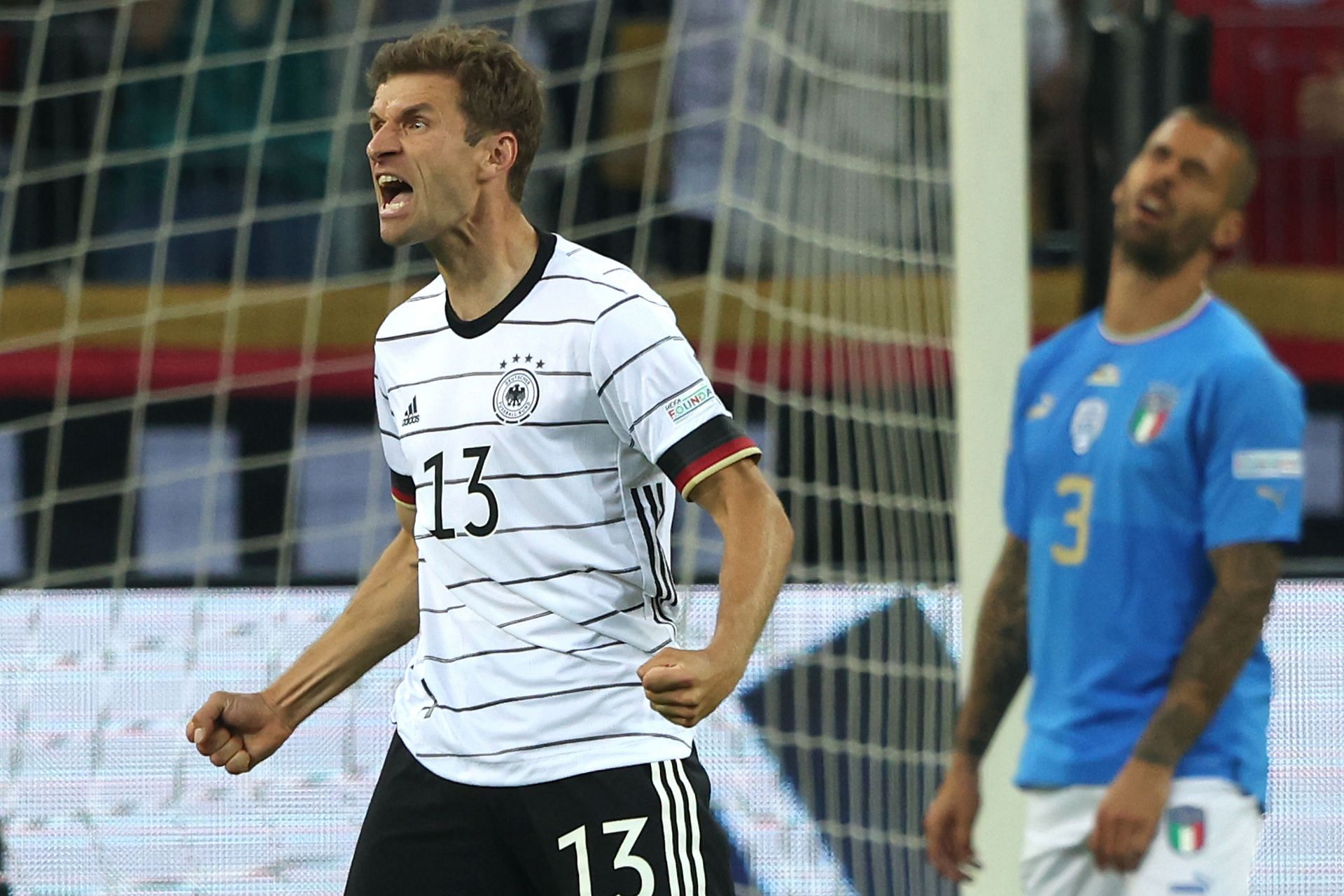 Thomas Muller celebrates scoring Germany&#039;s third goal against Italy.