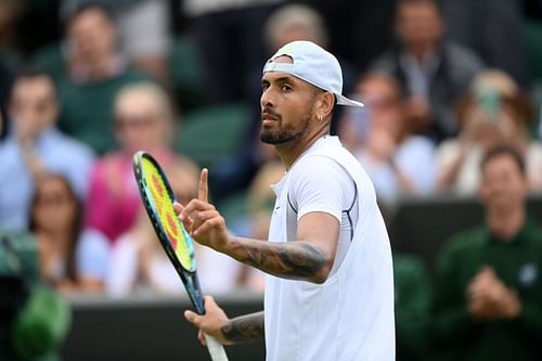 Nick Kyrgios in action at The Championships - Wimbledon 2022