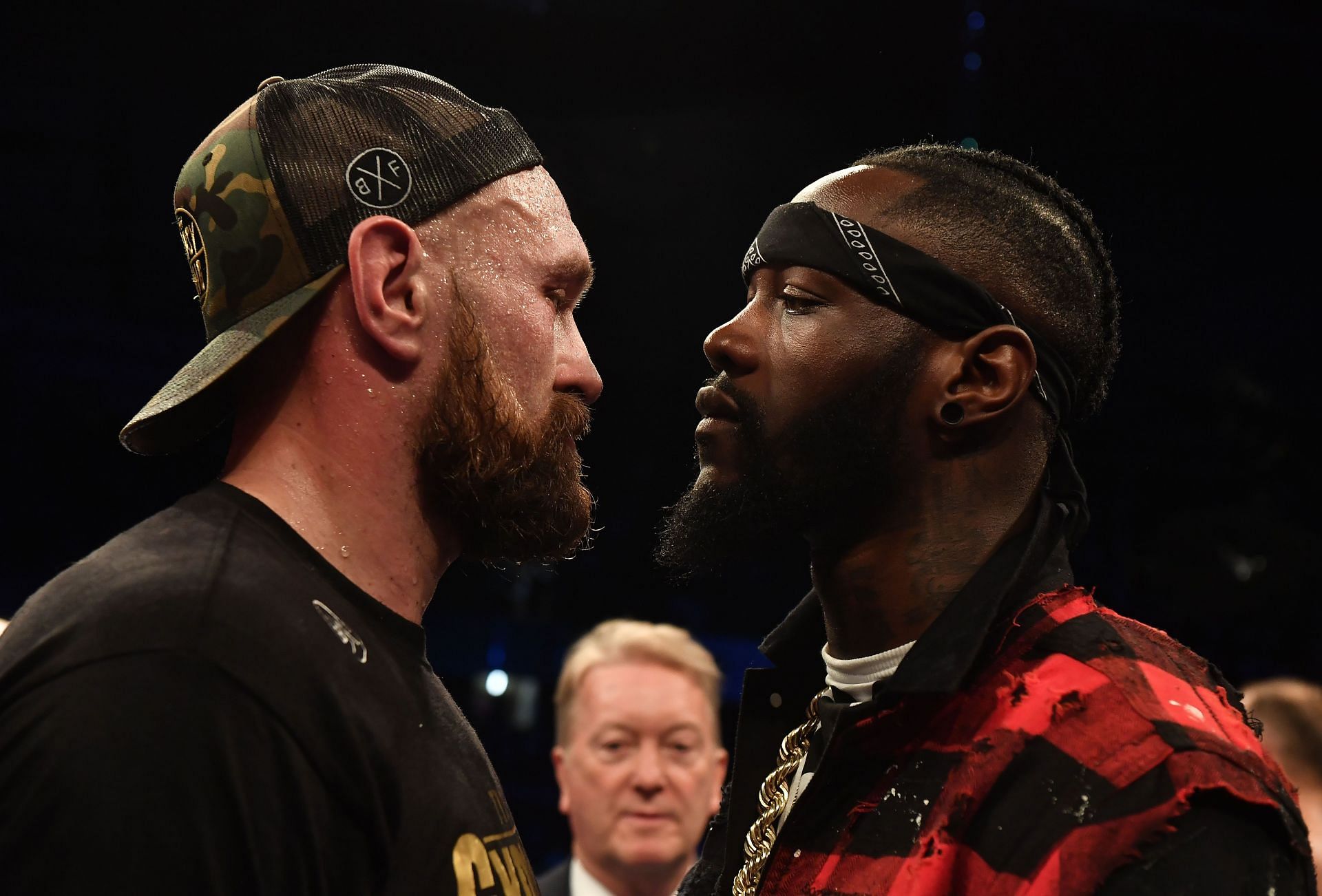 Tyson Fury (L) believes that Deontay Wilder (R) should stay out of the ring.