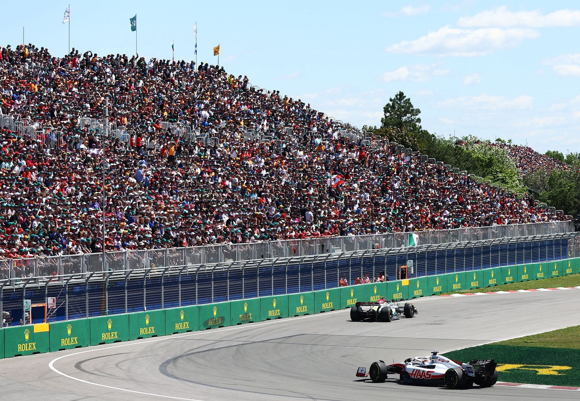 Lewis Hamilton and Kevin Magnussen in action during the 2022 F1 Canadian GP. (Photo by Clive Rose/Getty Images)