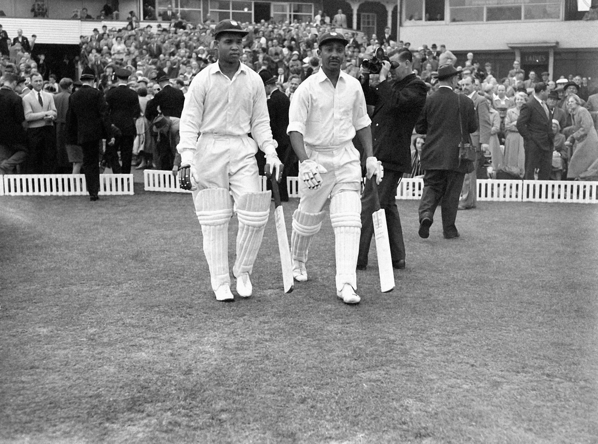 Frank Worrell walking out with Gary Sobers to open the West Indies innings against England in 1957. 