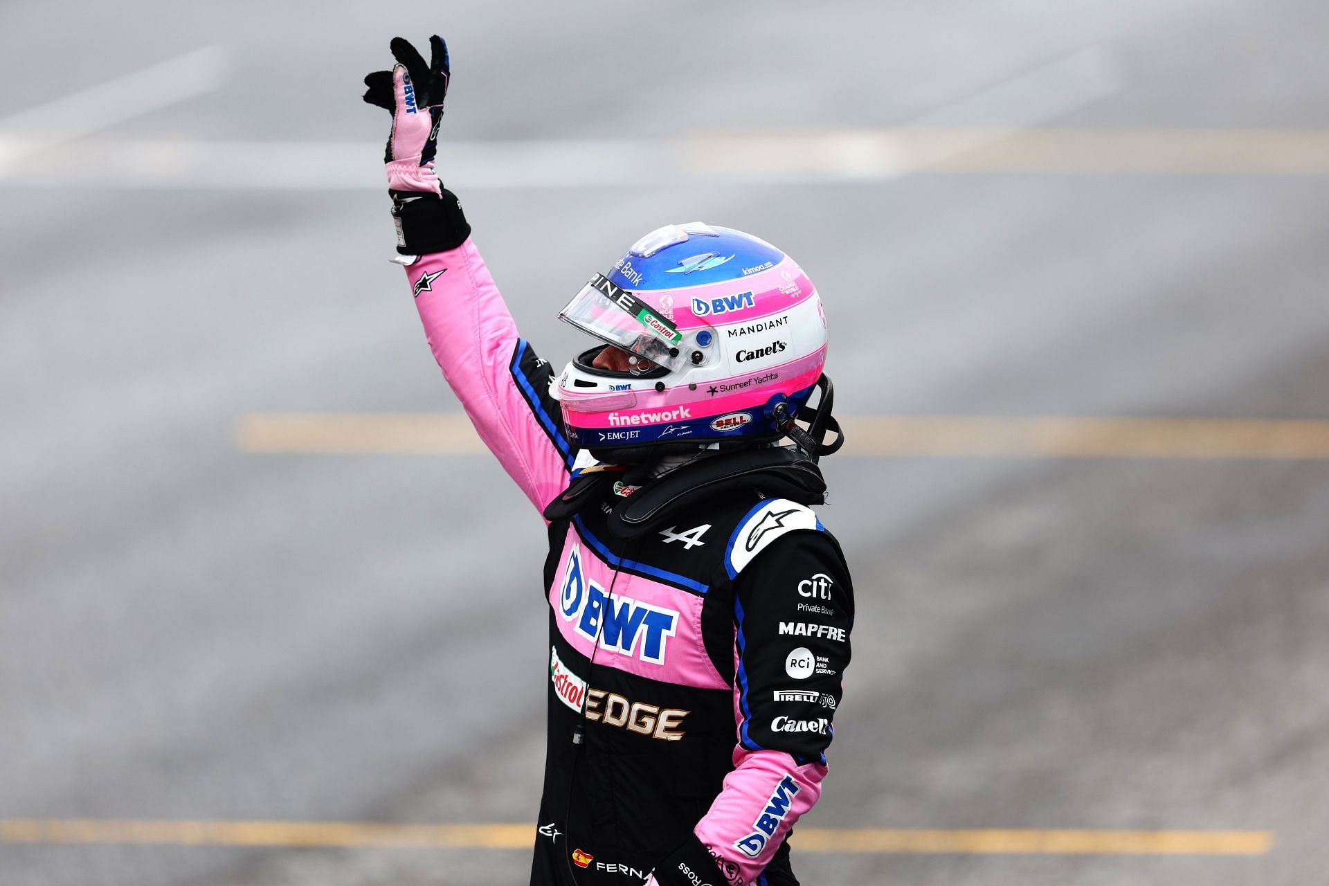 Fernando Alonso gestures to fans after qualifying in P2 for the 2022 F1 Canadian GP. (Photo by Clive Rose/Getty Images)