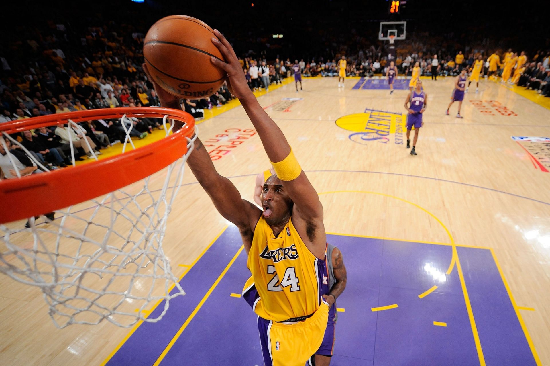 Kobe Bryant of the Los Angeles Lakers dunks the ball against the Phoenix Suns.