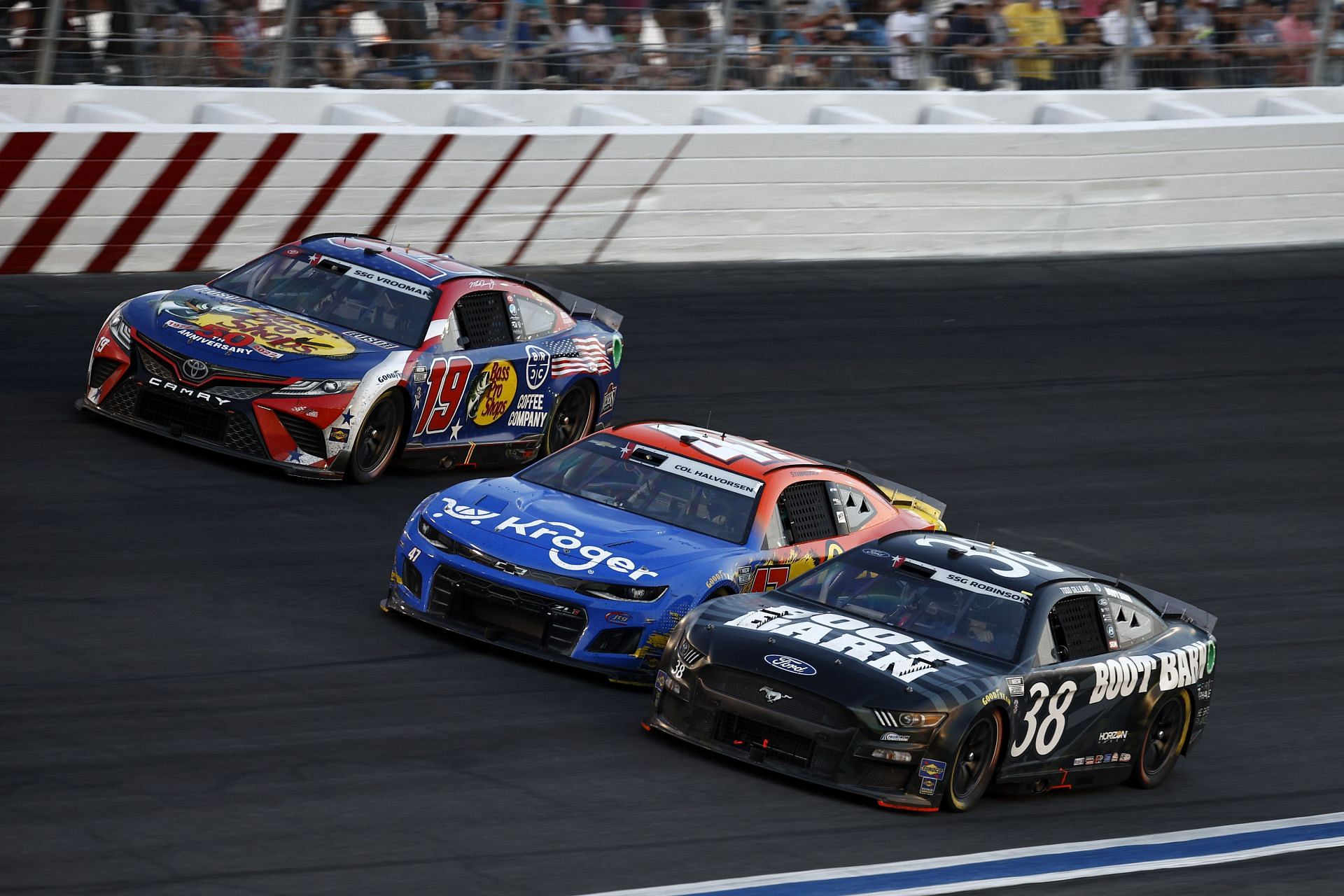 Todd Gilliland, Ricky Stenhouse Jr., and Martin Truex Jr. during the NASCAR Cup Series Coca-Cola 600 at Charlotte Motor Speedway. (Photo by Jared C. Tilton/Getty Images)