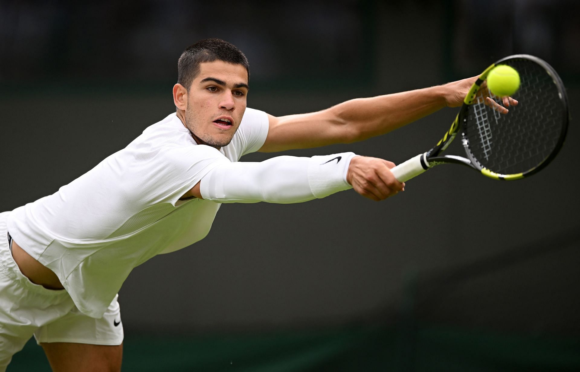 Carlos Alcaraz is 19 and playing in his third tournament at the All England Lawn Tennis and Croquet Club.