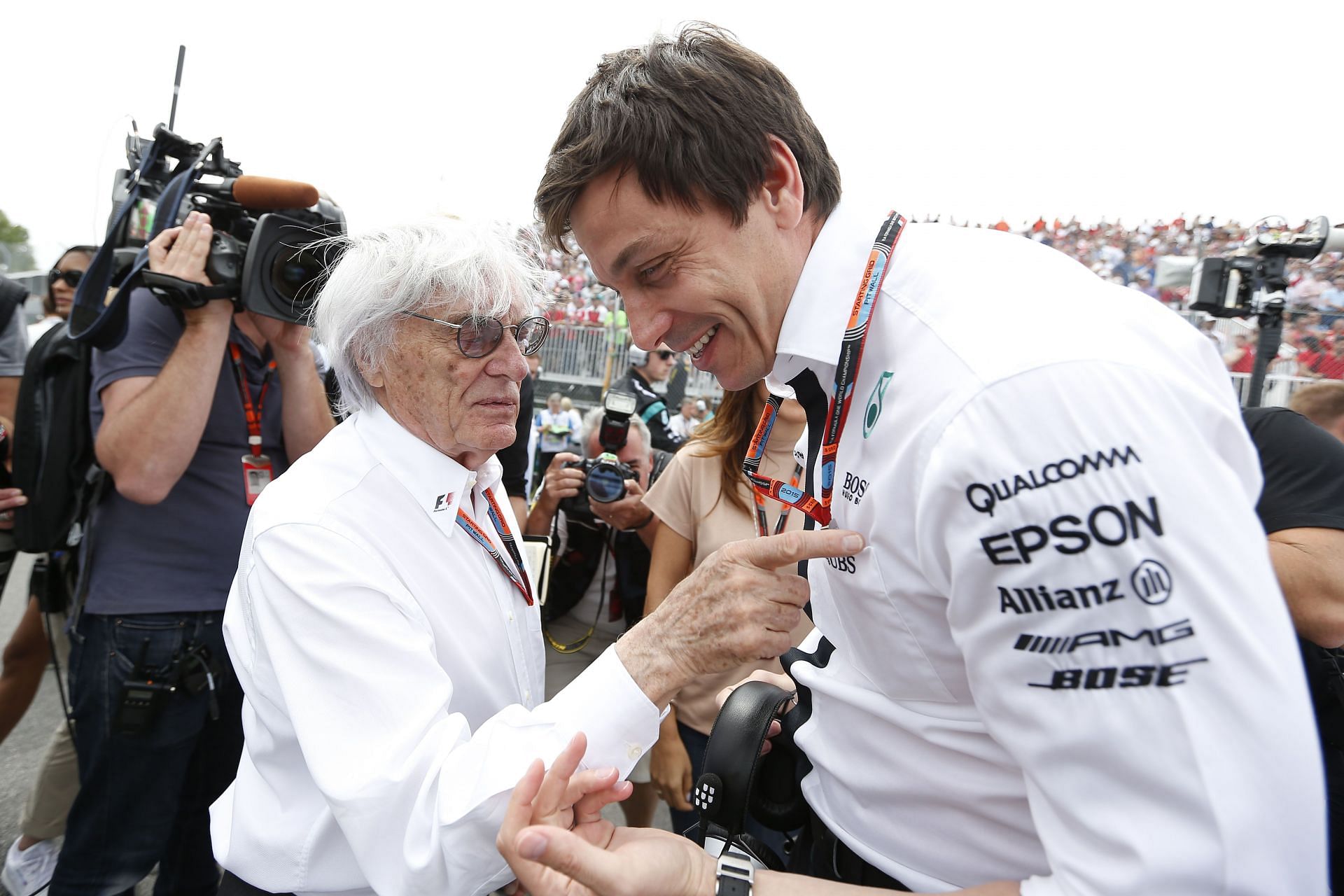 F1 supremo Bernie Ecclestone speaks with Mercedes GP Executive Director Toto Wolff during the Canadian Formula One Grand Prix. (Photo by Charles Coates/Getty Images)
