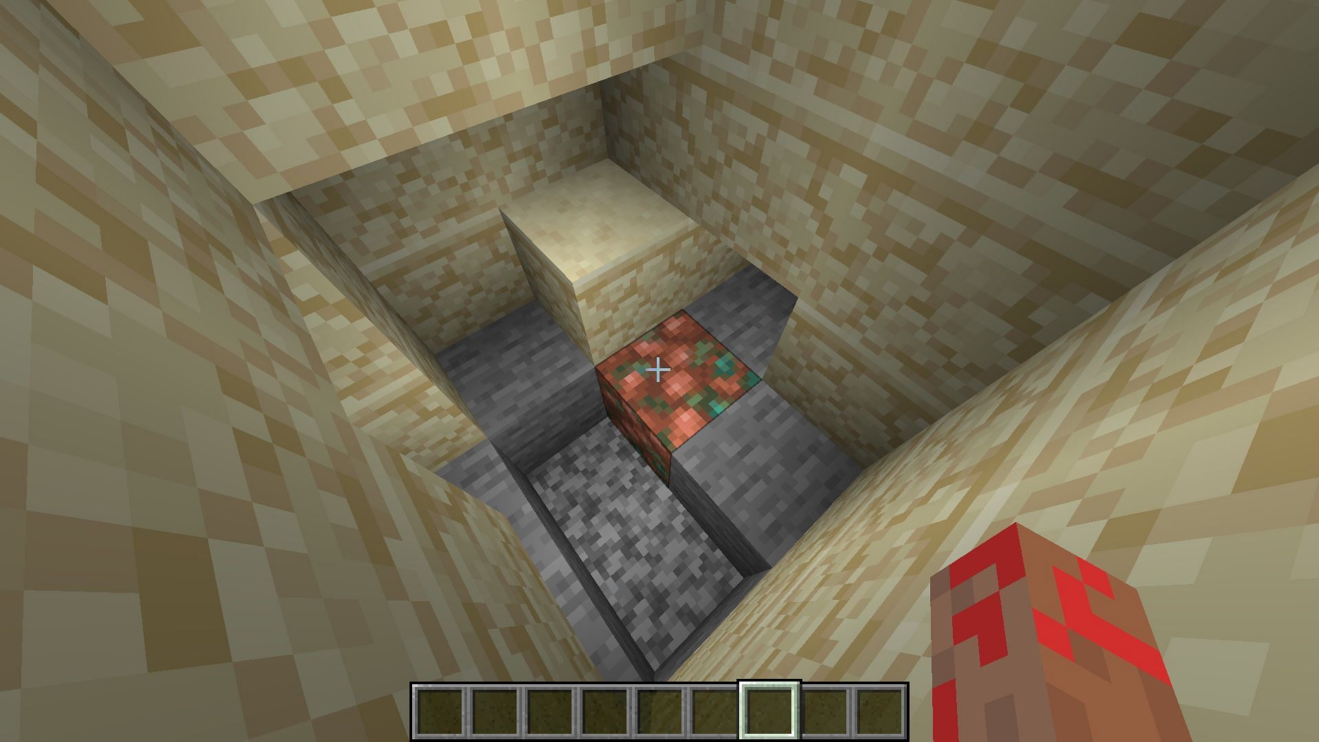 Block of copper underneath a beach biome (Image via Minecraft 1.19)