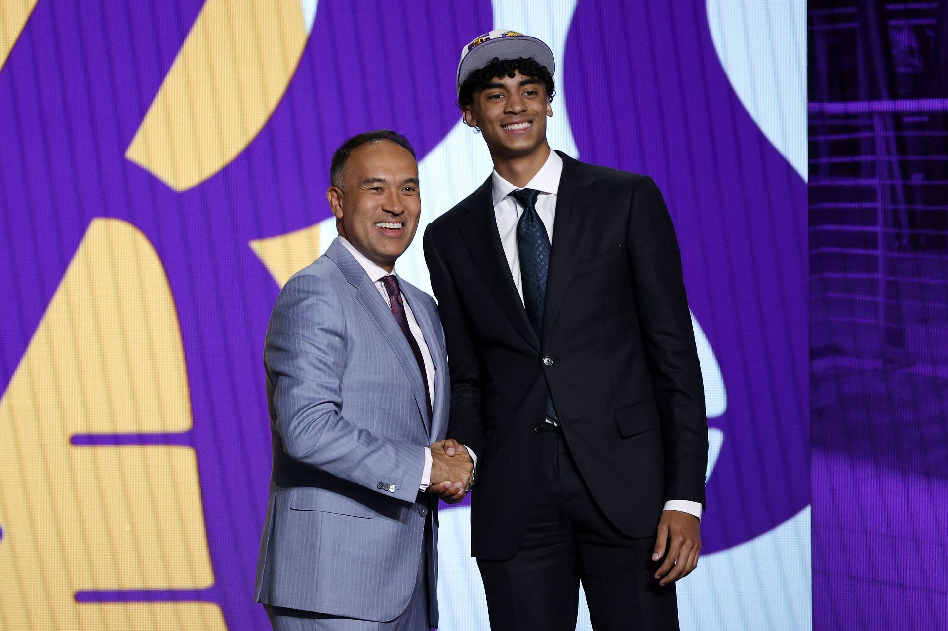 Deputy commissioner Mark Tatum and Max Christie pose for photos after Christie was drafted 35th overall by the LA Lakers during the 2022 NBA Draft at Barclays Center on June 23, 2022 in New York City.