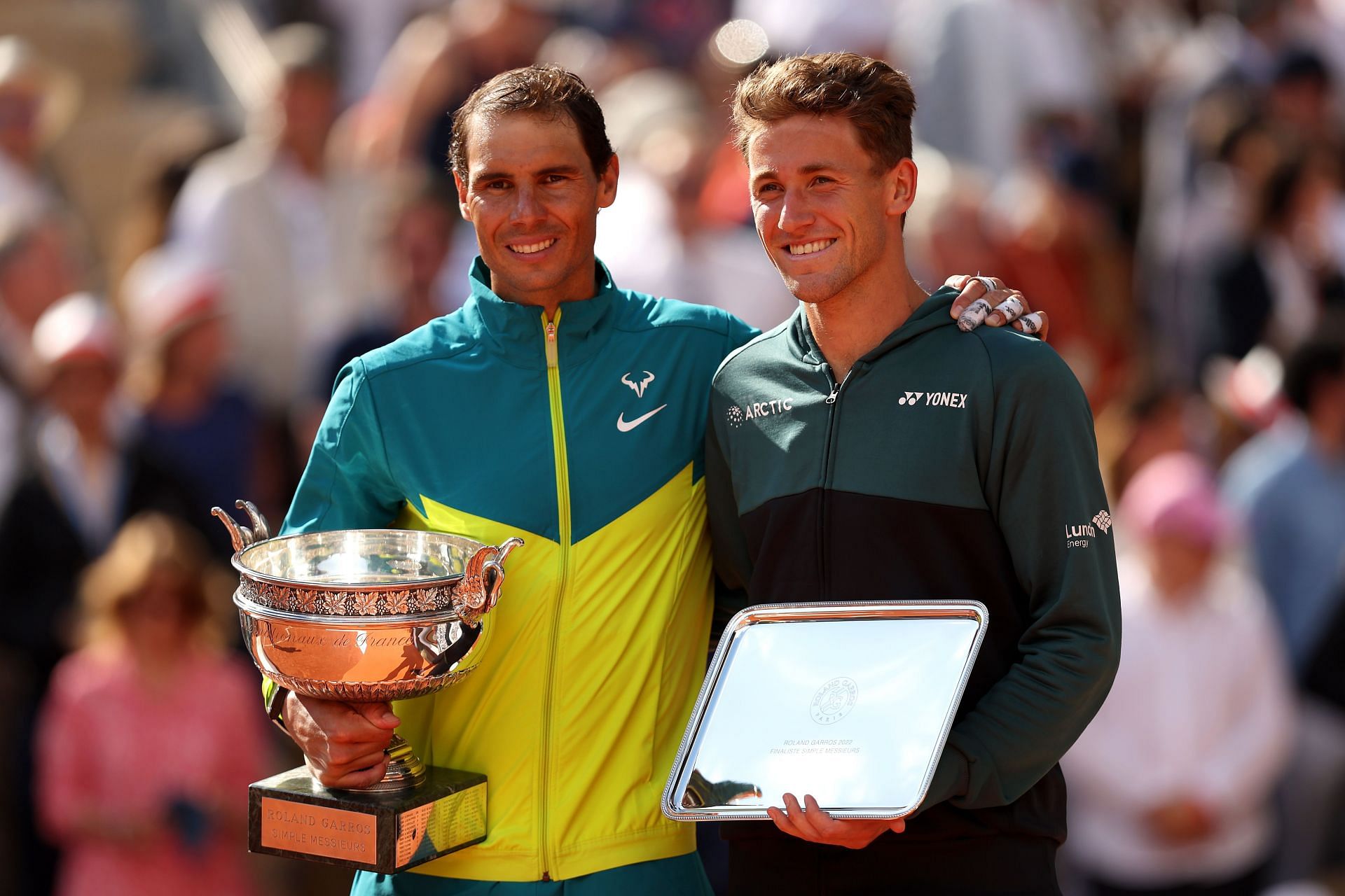 Rafael Nadal and Casper Ruud pose with their French Open tropies.