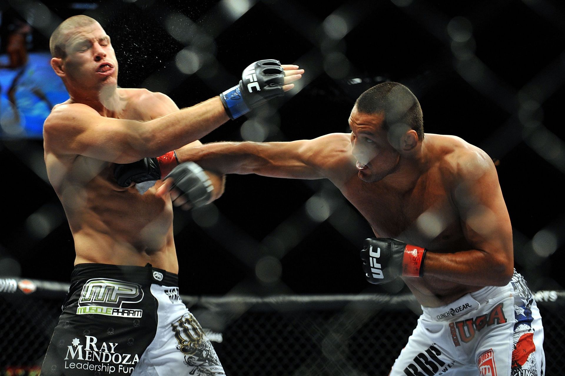 Michael Bisping (left) and Dan Henderson (right) fought in 2009 and 2016