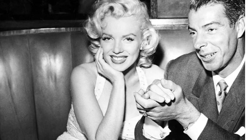 Marilyn Monroe And Joe Dimaggio by Bettmann