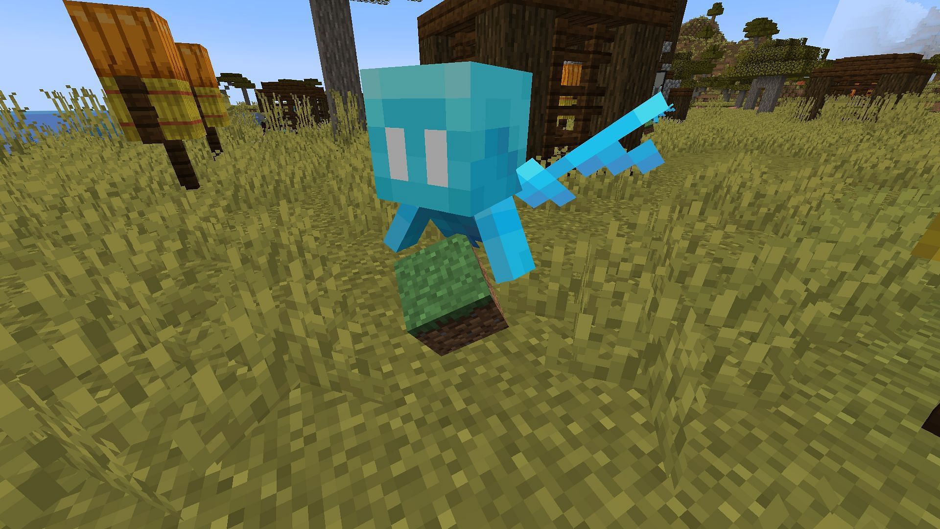 The new mob holding a grass block given by the player (Image via Mojang)