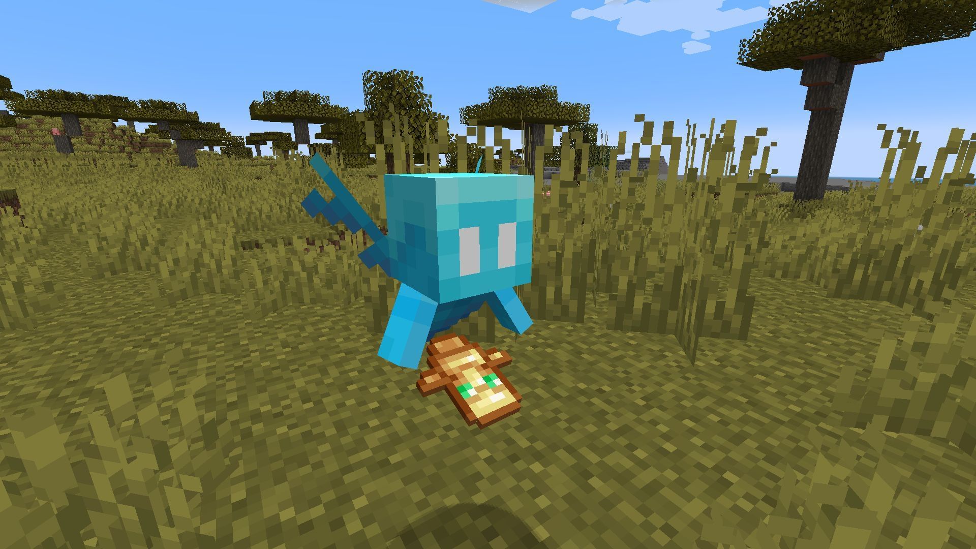 An Allay holding a totem of undying, which will function as normal for the mob (Image via Minecraft)