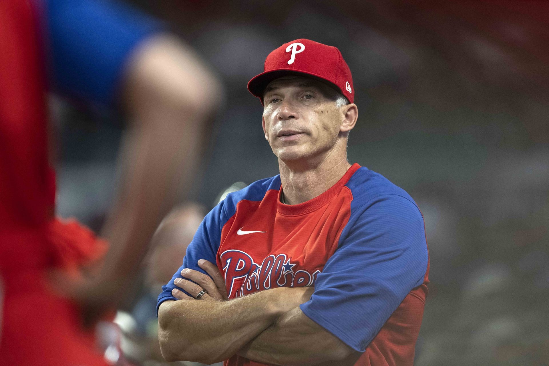 Joe Girardi looks on during batting practice of a Philadelphia Phillies v Atlanta Braves game.