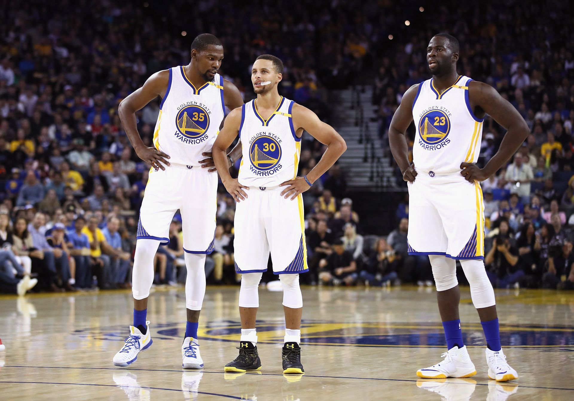 Steph Curry, Draymond Green and Kevin Durant during a 2016 game between the Los Angeles Clippers v Golden State Warriors