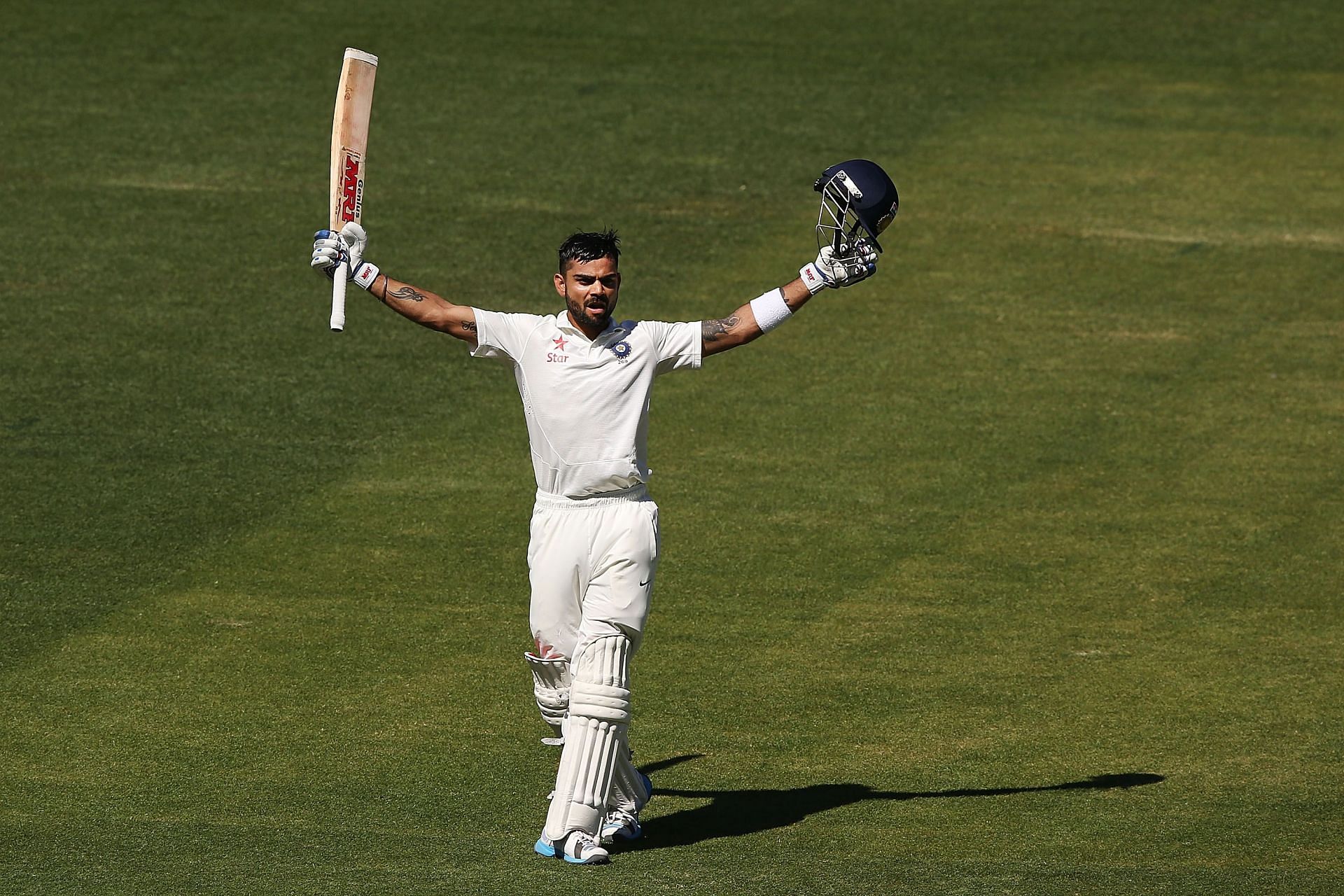 Virat Kohli celebrates his century during day five of 2014 Adelaide Test. Pic: Getty Images