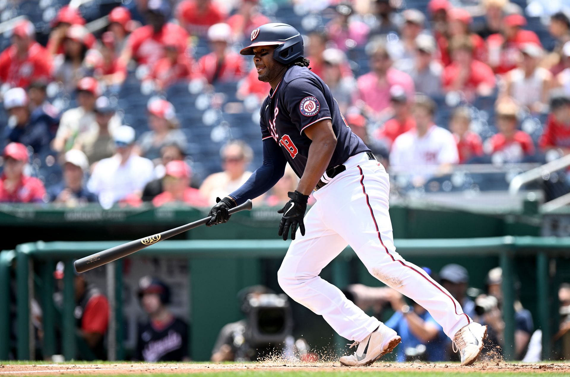 Josh Bell gets a hit during a Colorado Rockies v Washington Nationals game.