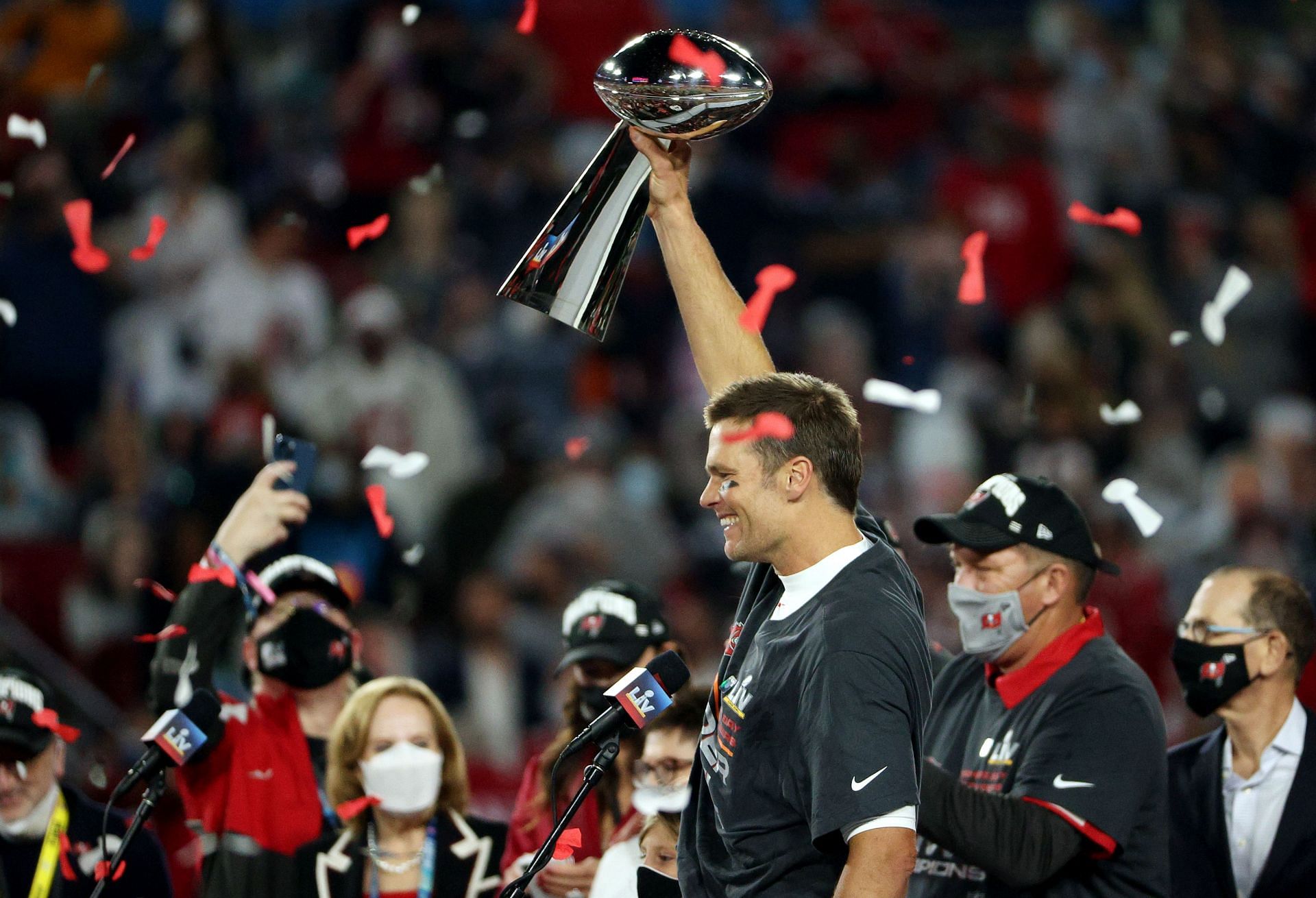 No. 12 hoisting the Lombardi Trophy after Super Bowl LV