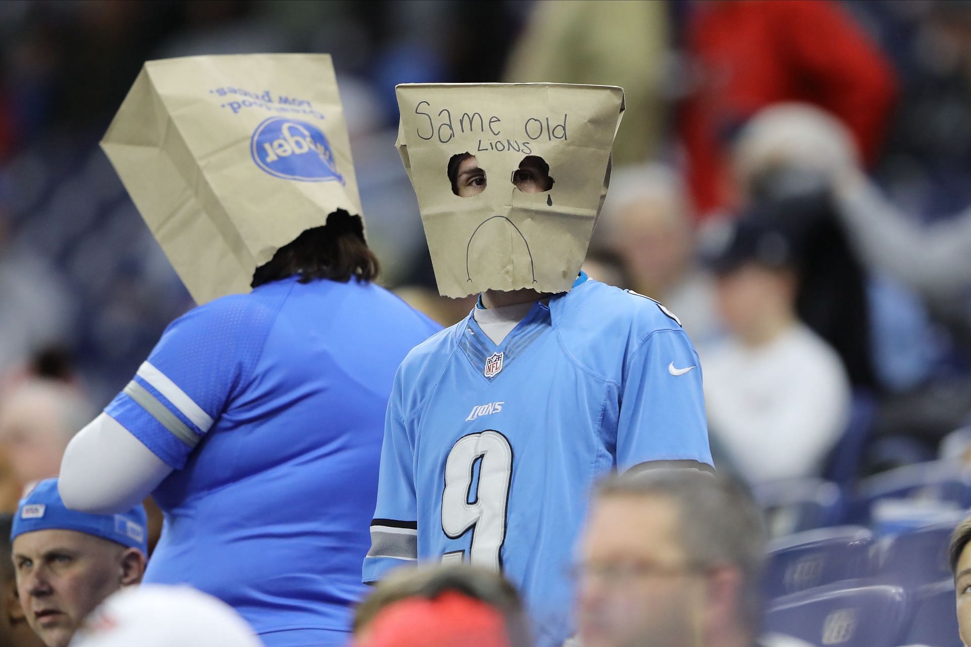 Detroit Lions fans with bags over their heads