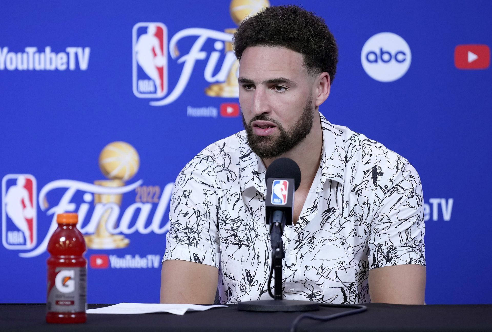 Klay Thompson of the Golden State Warriors talks with the media during a press conference after Game 5.