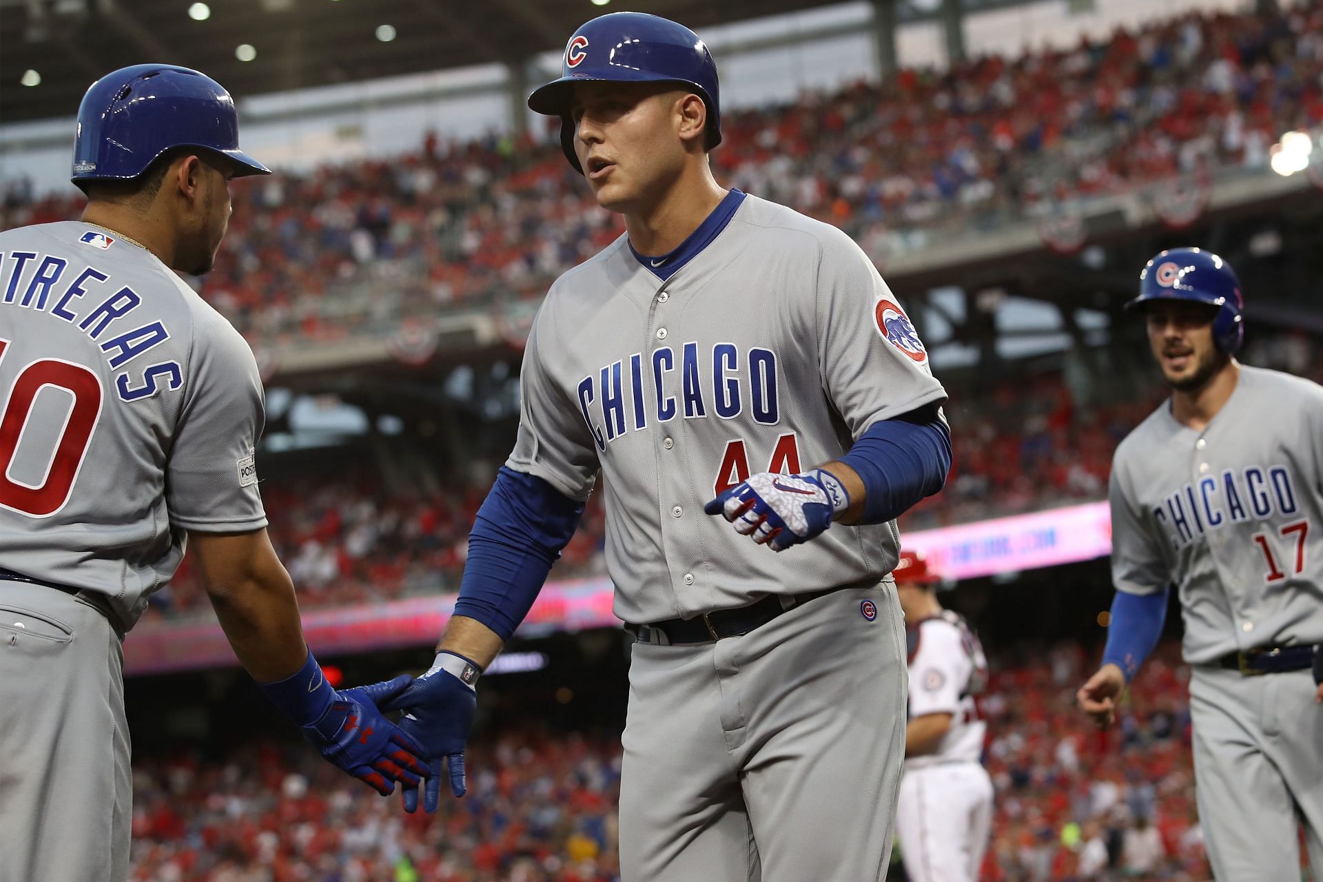 Anthony Rizzo (right) and Willson Contreras (left) celebreate a two-run home run by Kris Bryant during the MLB Divisional Round - Chicago Cubs v Washington Nationals - Game Two.