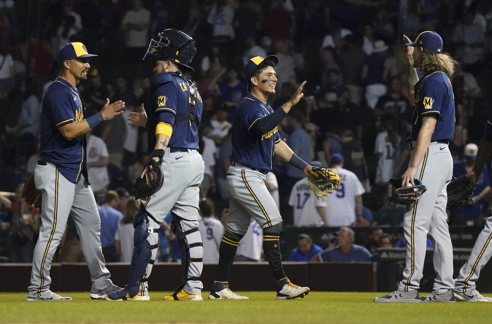 The Milwaukee Brewers celebrate a win over the Chicago Cubs.