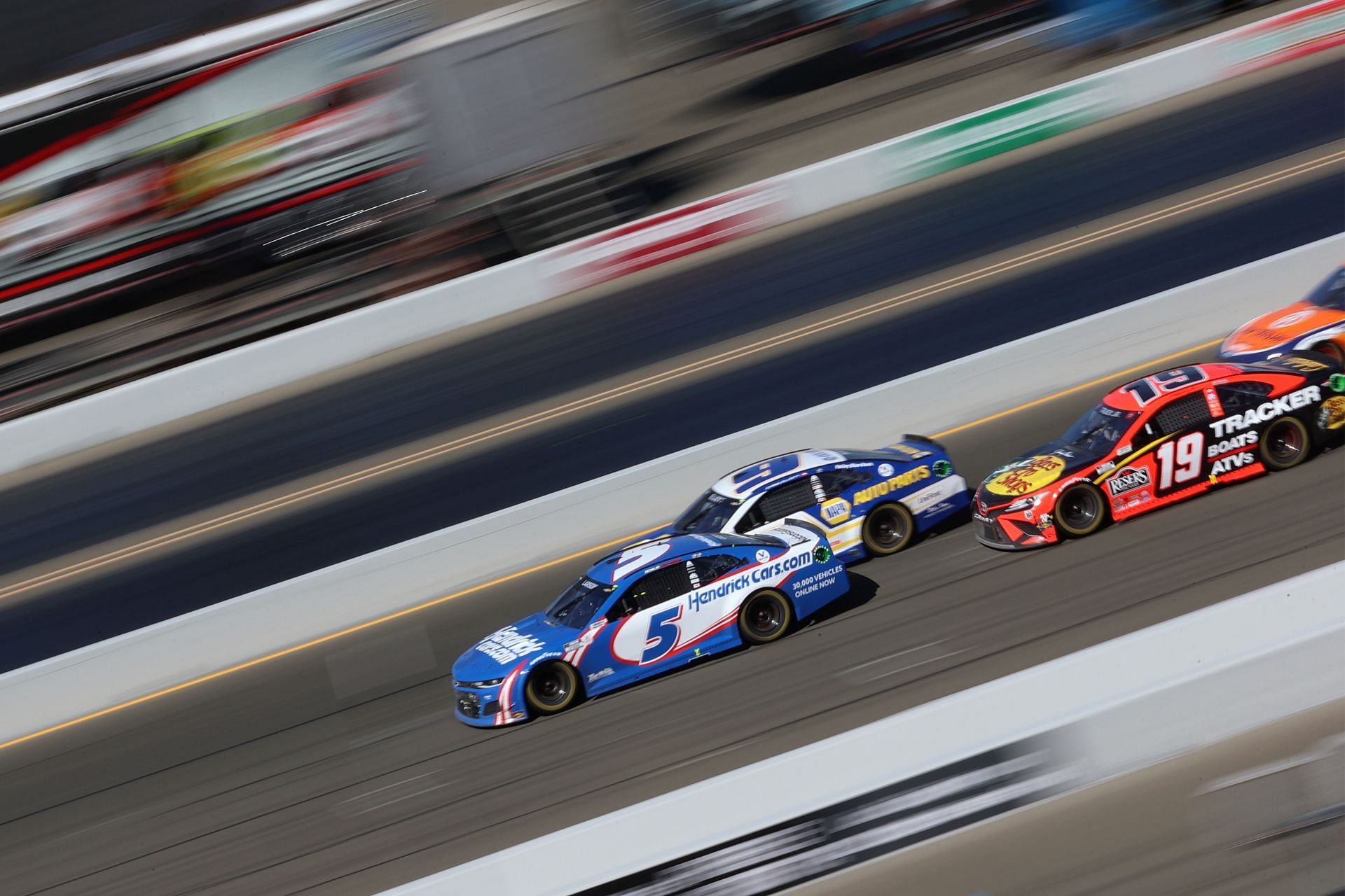 Kyle Larson and Martin Truex Jr., race during the NASCAR Cup Series Toyota/Save Mart 350 at Sonoma Raceway (Photo by Carmen Mandato/Getty Images)