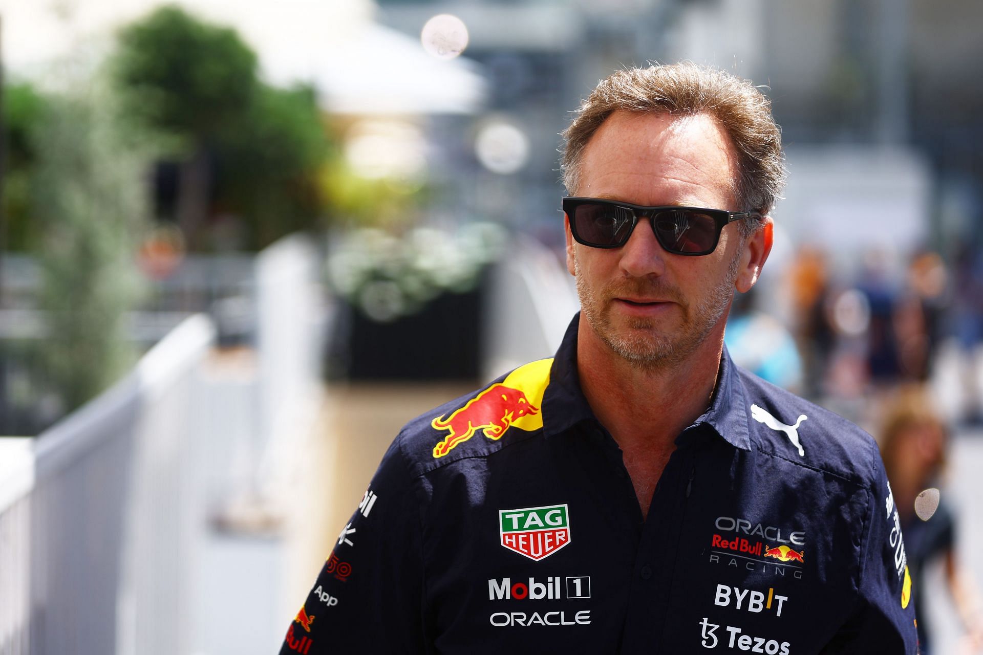 Red Bull Racing team principal Christian Horner walks in the Paddock ahead of the 2022 F1 Grand Prix of Azerbaijan (Photo by Mark Thompson/Getty Images)