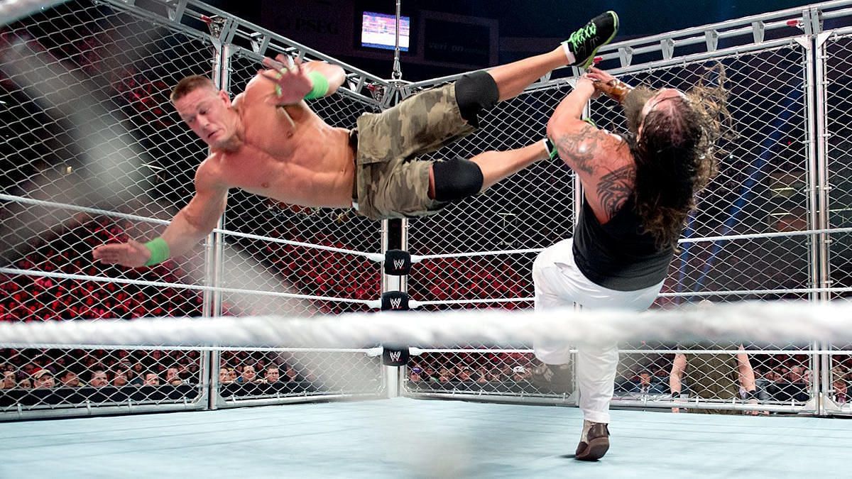 Cena executes a dropkick on Bray Wyatt