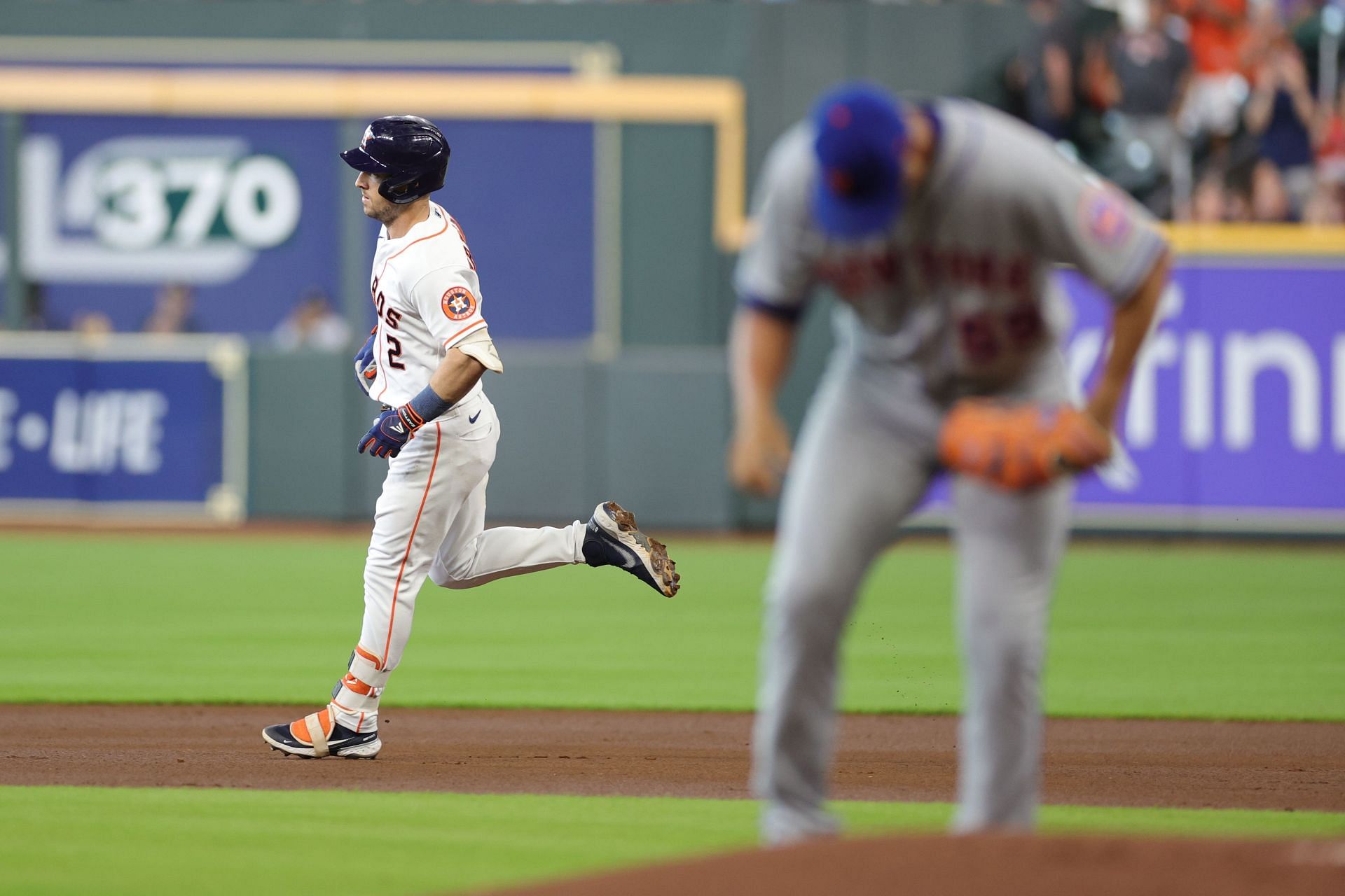 Alex Bregman rounding the bases after a two run homer