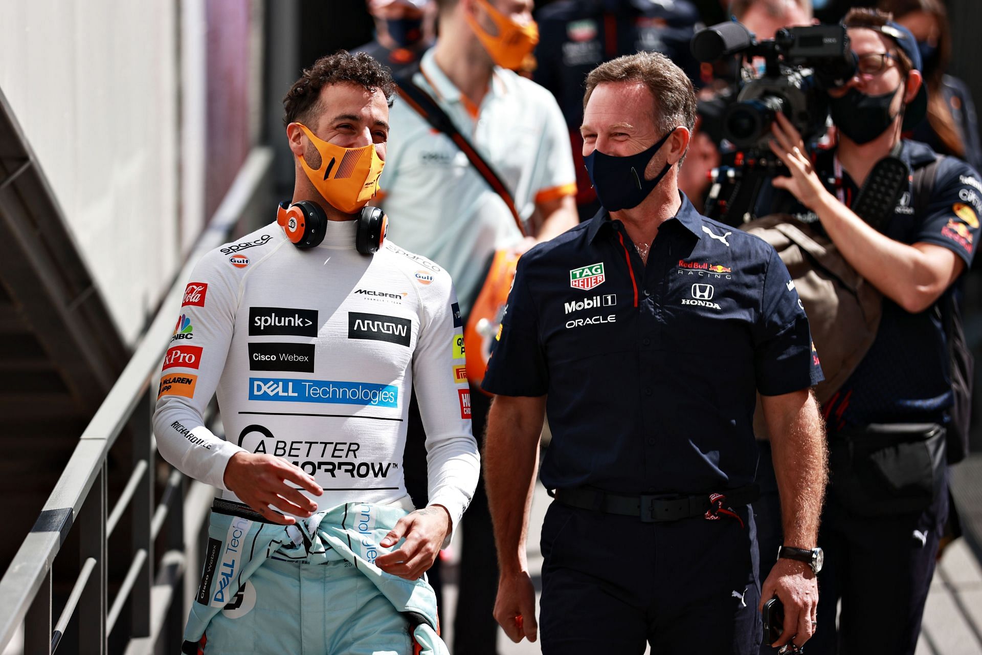 McLaren driver Daniel Ricciardo (left) and Red Bull team principal Christian Horner share a moment during the 2021 F1 Monaco GP weekend (Photo by Mark Thompson/Getty Images)