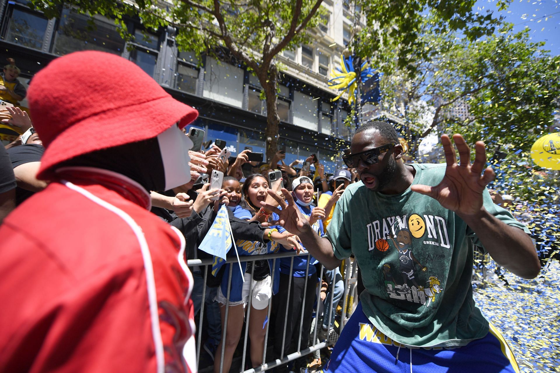 Draymond Green of the Golden State Warriors dances with fans in the crowd during their Victory Parade