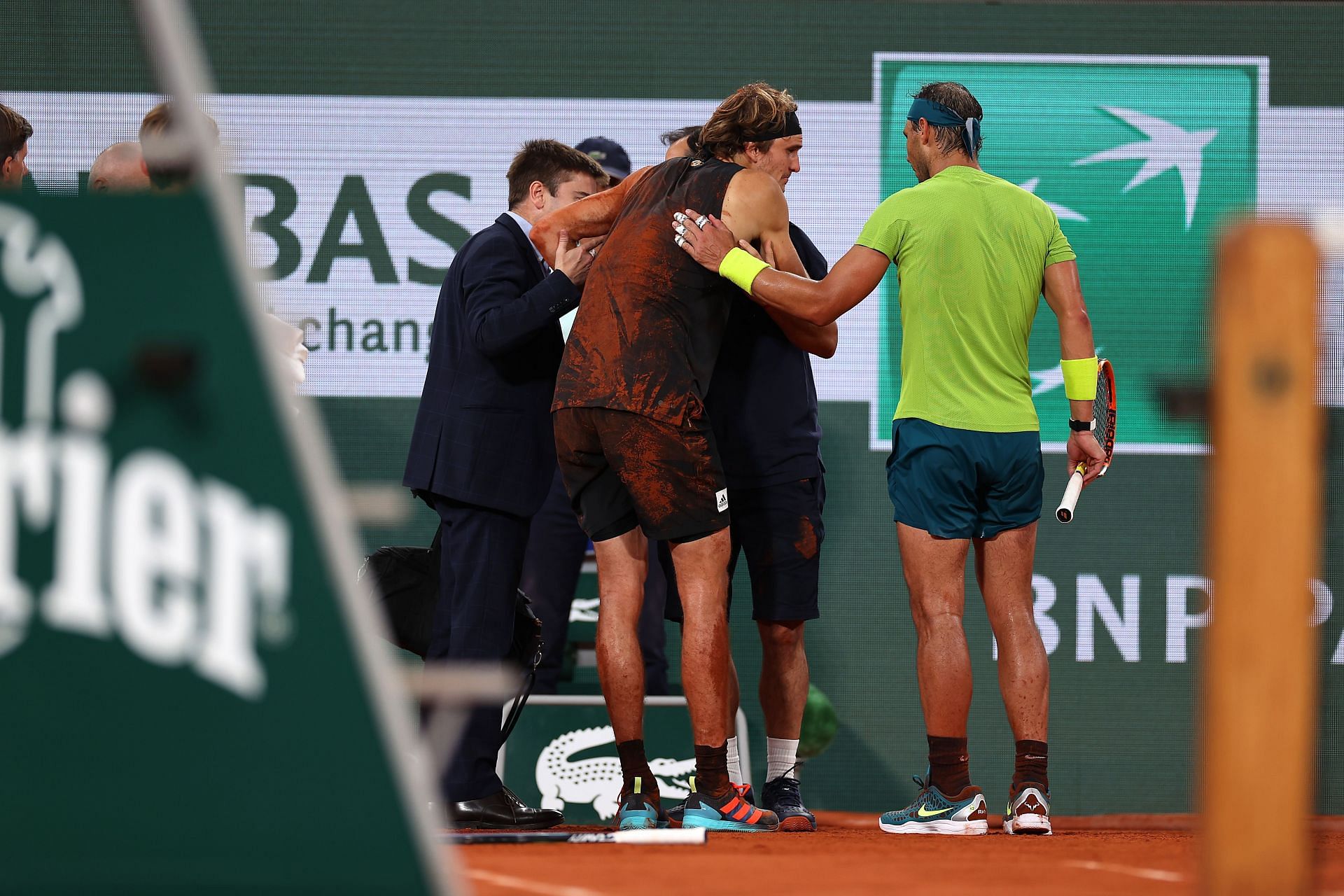 Rafael Nadal [right] comforts Alexander Zverev after the latter&#039;s fall