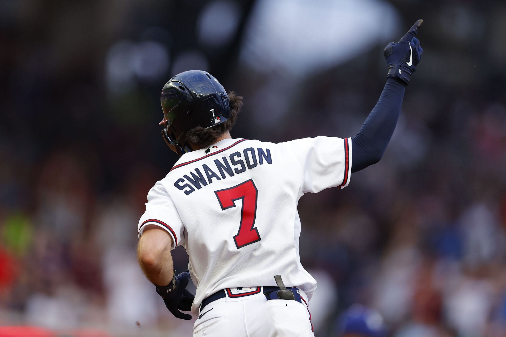Dansby Swanson of the Atlanta Braves rounds first after hitting a two-run home run.
