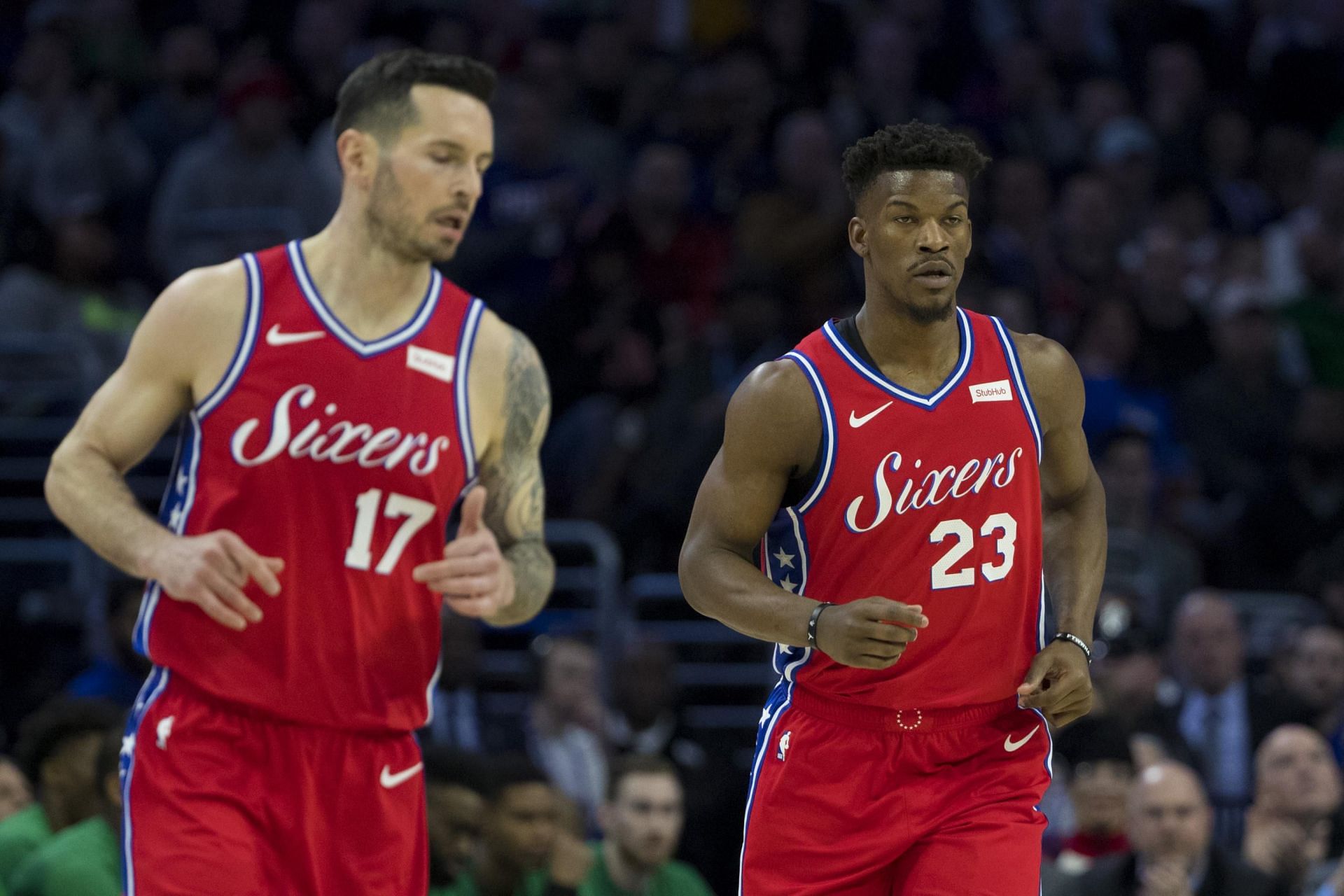 Jimmy Butler and JJ Redick in action
