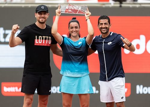 Ons Jabeur (middle) celebrates with her team after winning the 2022 Berlin Open