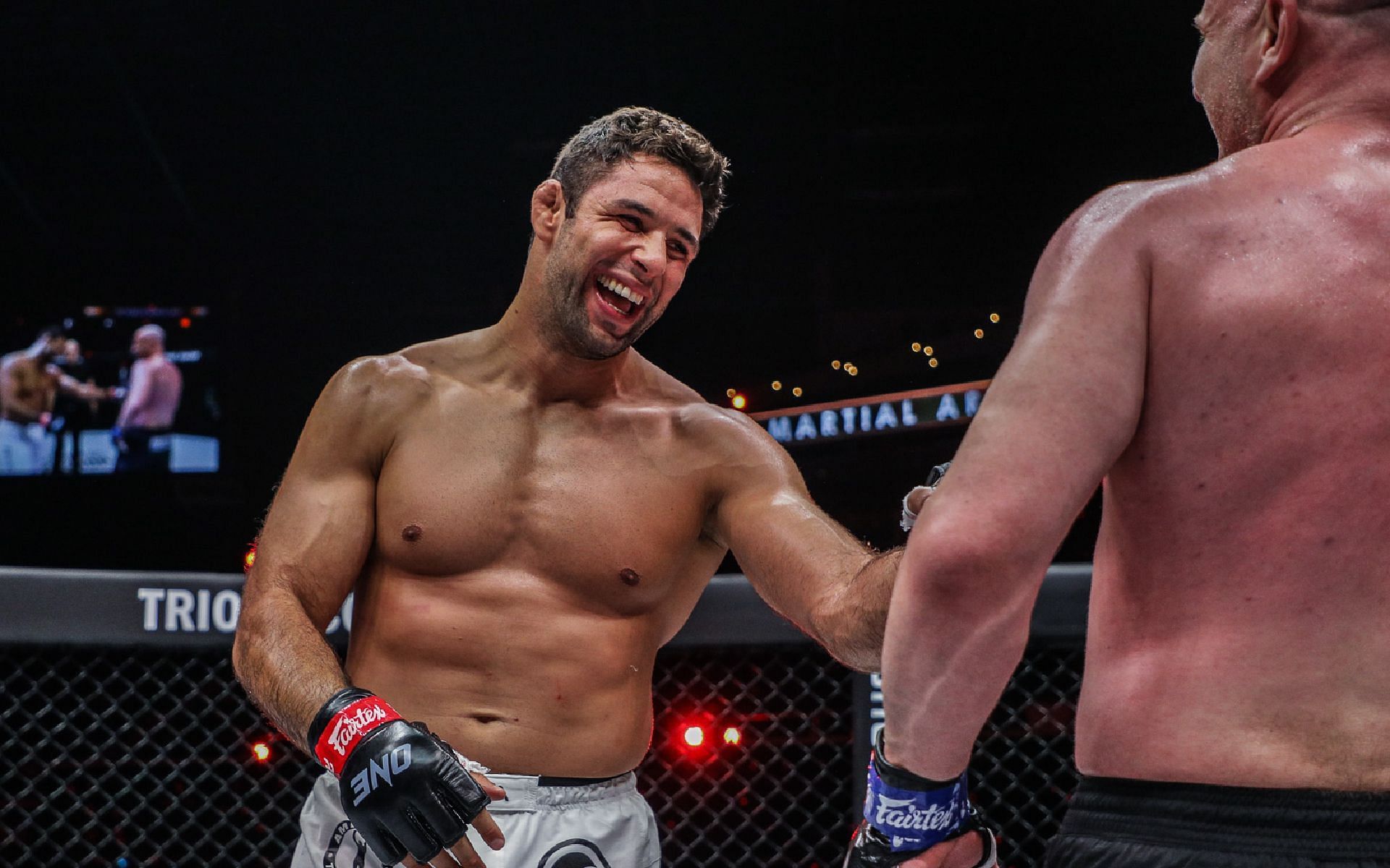 Marcus &#039;Buchecha&#039; Almeida (left) shares a lighthearted moment with Simon Carson (right) following ONE 158. [Photo ONE Championship]