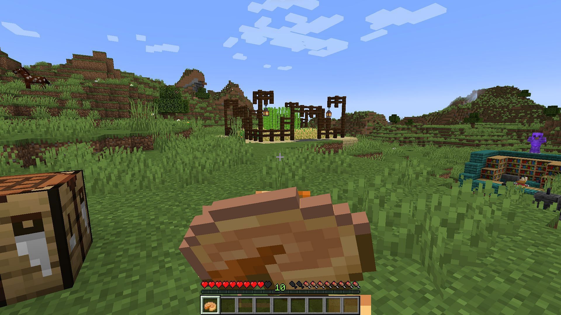 A player eating a pumpkin pie to fill their hunger (Image via Minecraft)