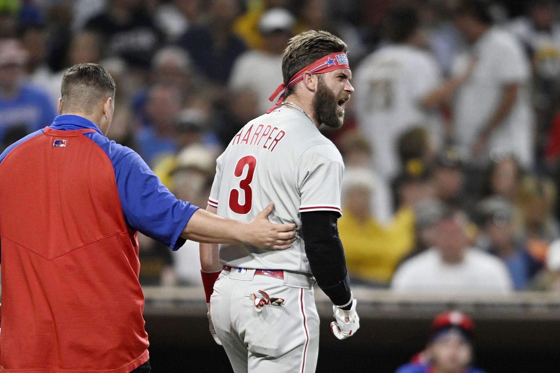 Bryce Harper of the Philadelphia Phillies yells at Blake Snell of the San Diego Padres after being hit with a pitch